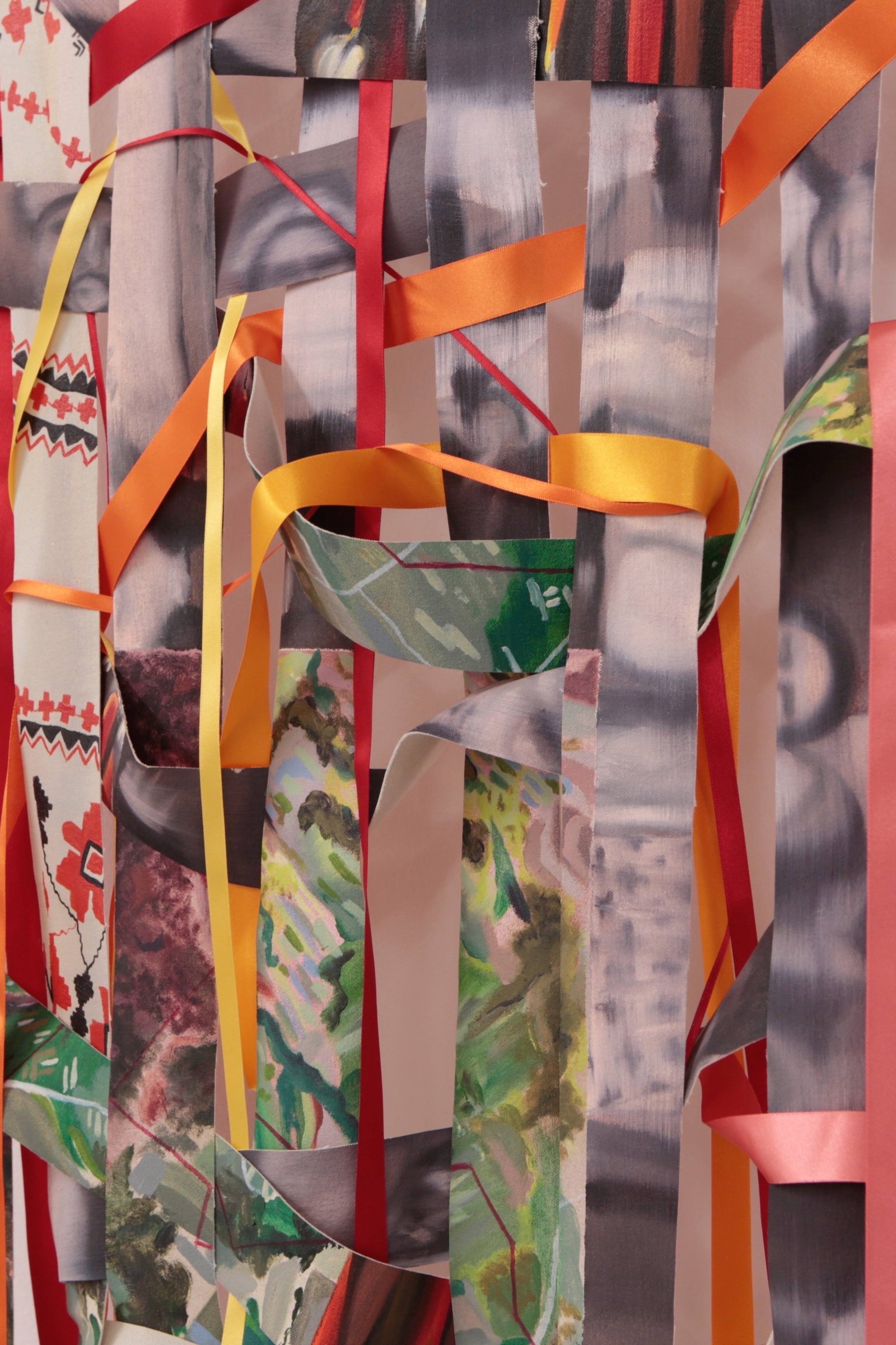 An installation with paintings, textiles and ladders is shown as a physical collage. The space they sit within is white and lit from above.