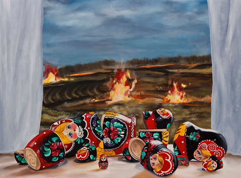 Matryoshka dolls are pulled apart and left scattered on a window sill. Out the window are prairie field fires.